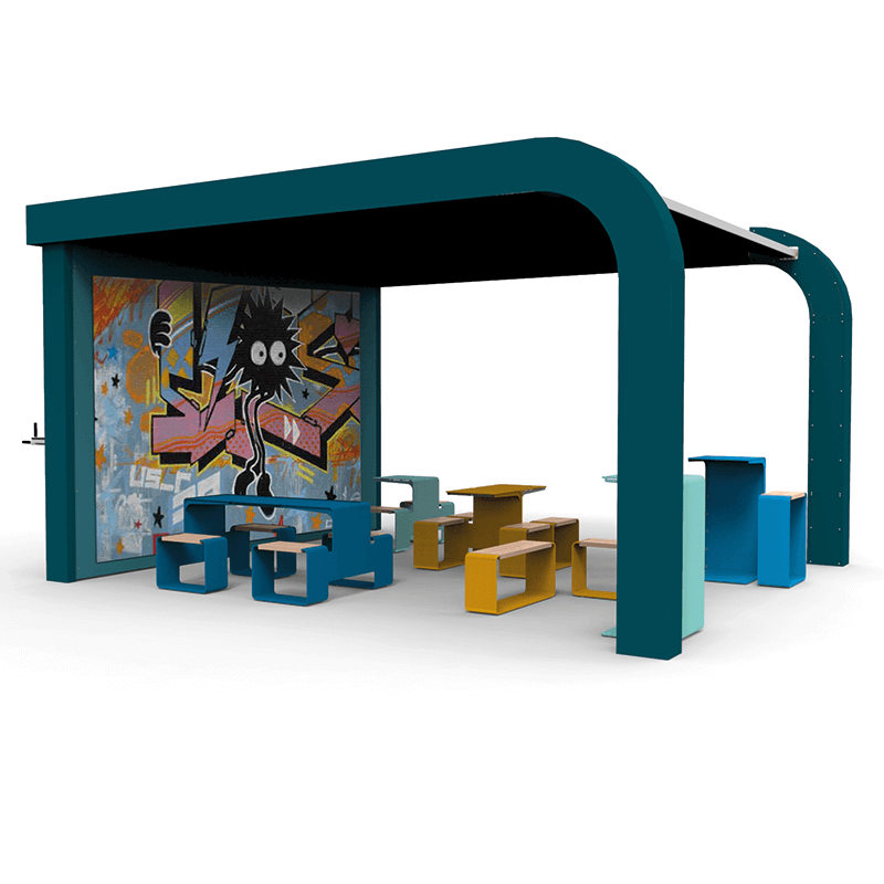 Pavillon moderne avec mur de grafitti et combinaison table-bancs colorés en plein air